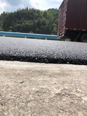 1,5 cm 2 cm Nakładka z asfaltu Bitumiczna naprawa dróg Konserwacja nawierzchni betonowych